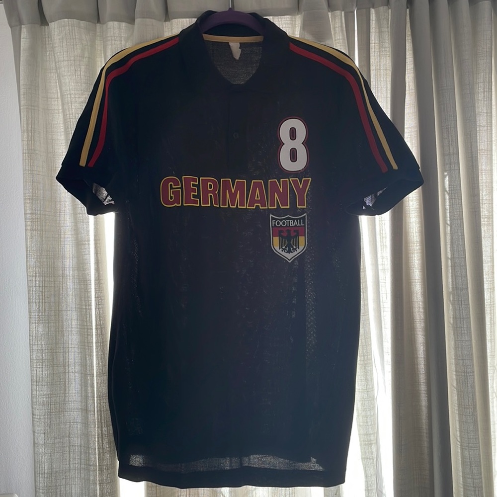 Men’s Germany soccer polo size large.